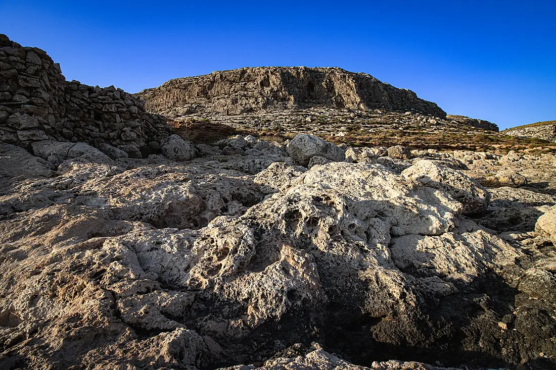 IRocks of Għar Lapsi –Nature art Facing Clear Blue Sky
